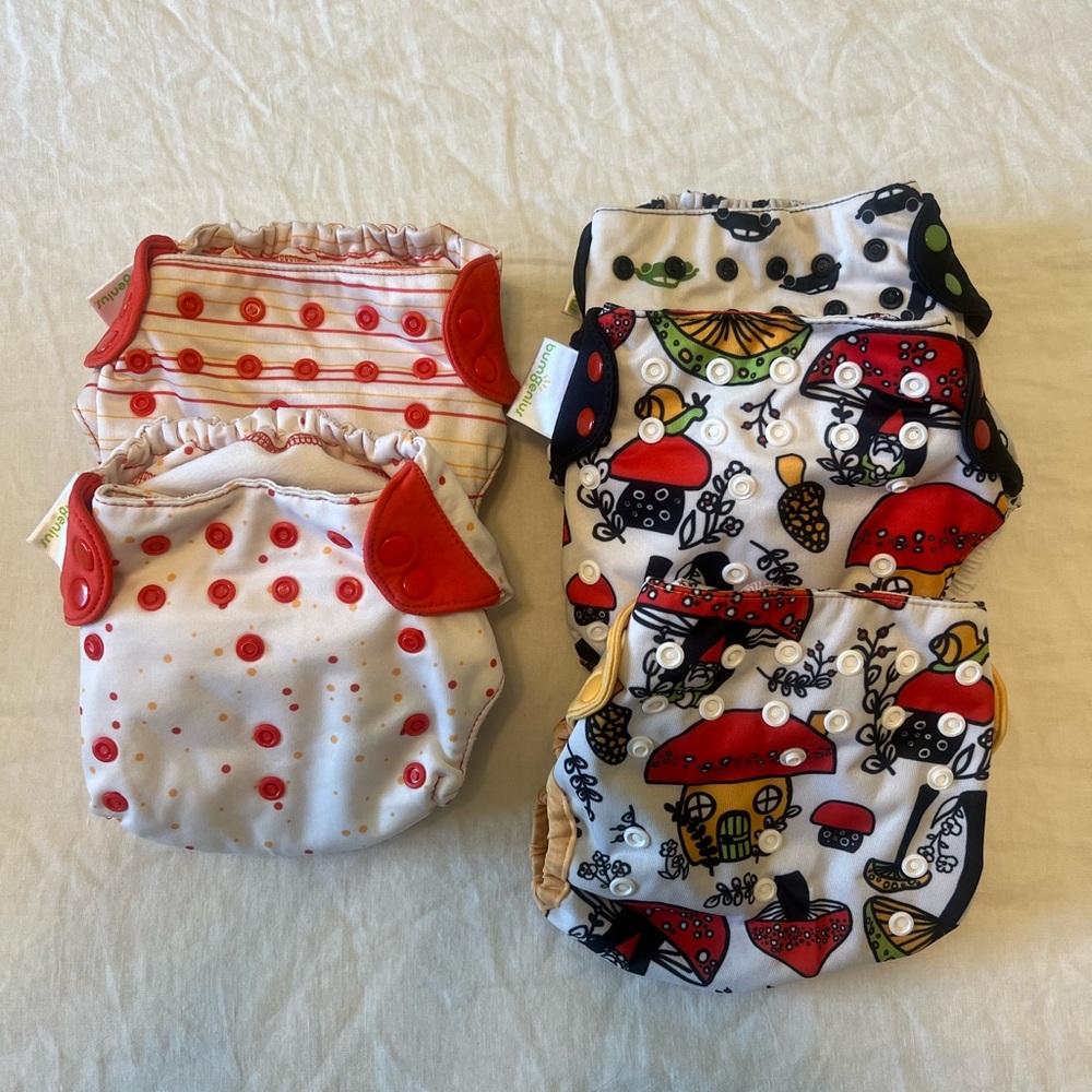 BumGenius cloth diaper lot. Mushroom, polka dot, stripes, and car prints.